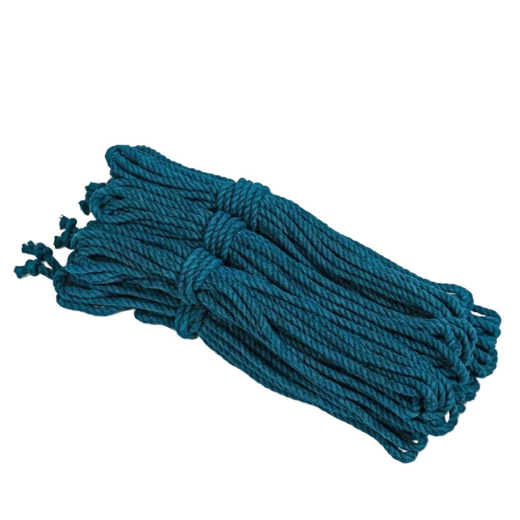 Bunch of blue cotton opes on a light gray background